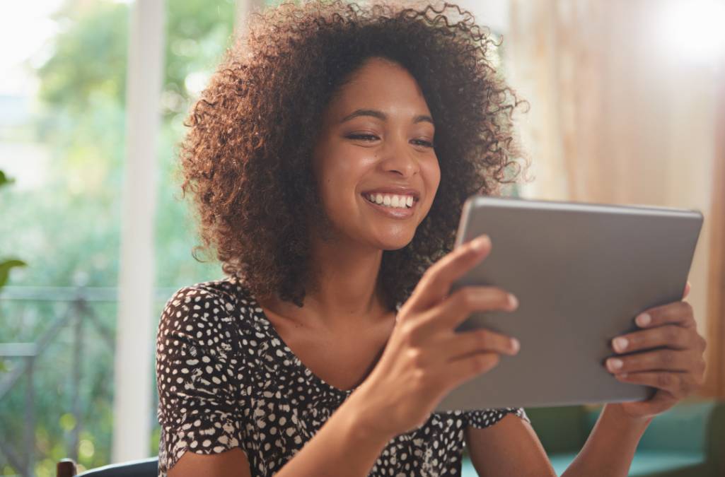 Woman looking at tablet device