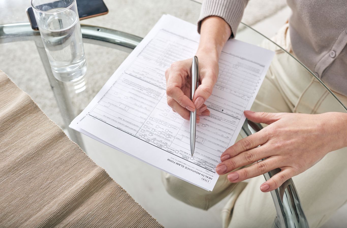 Woman filling out claims form