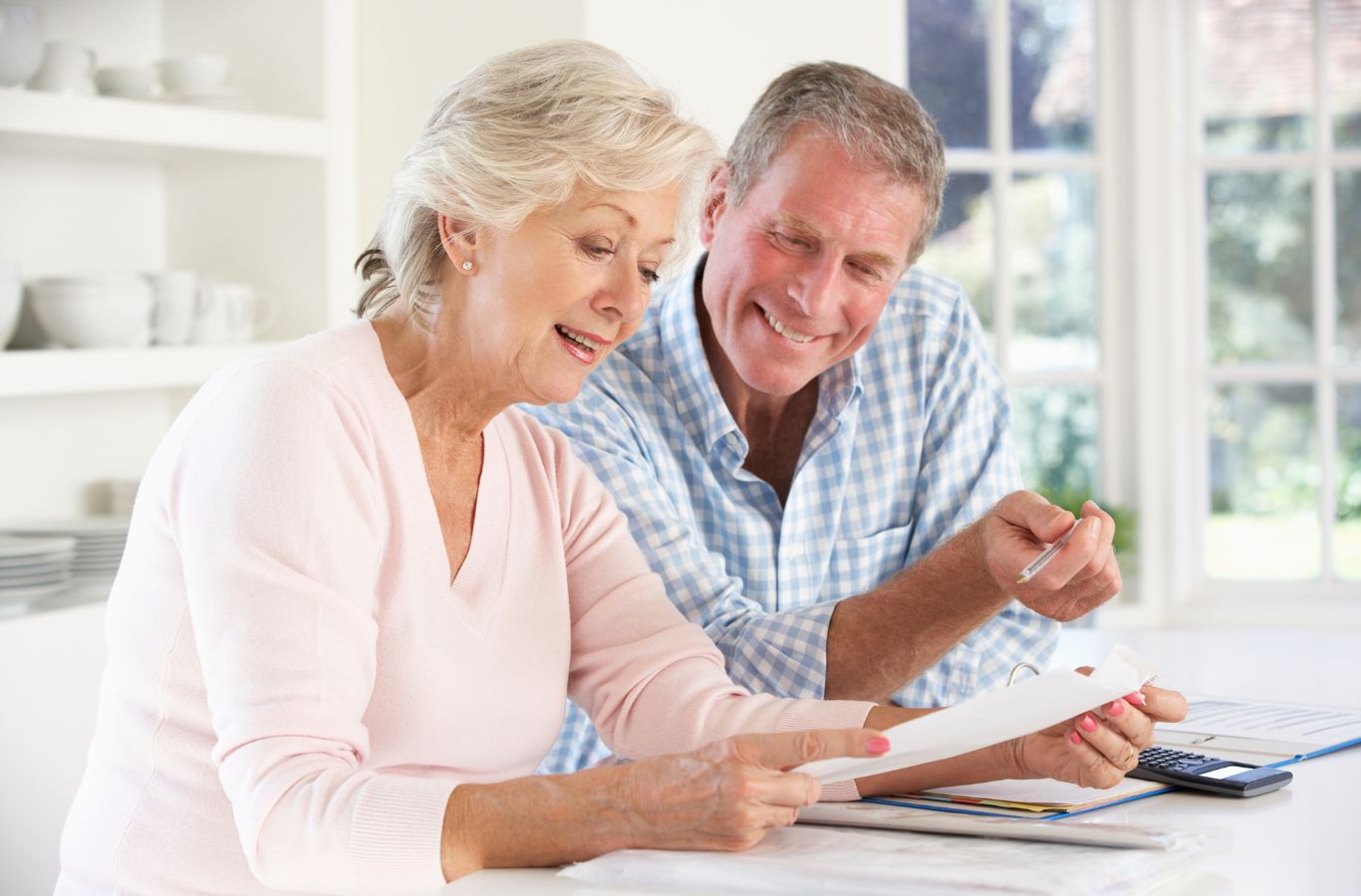 Older Couple reviewing documents